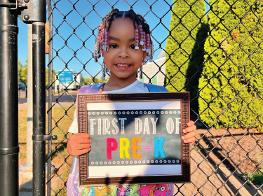 girl smiling with pre-k 